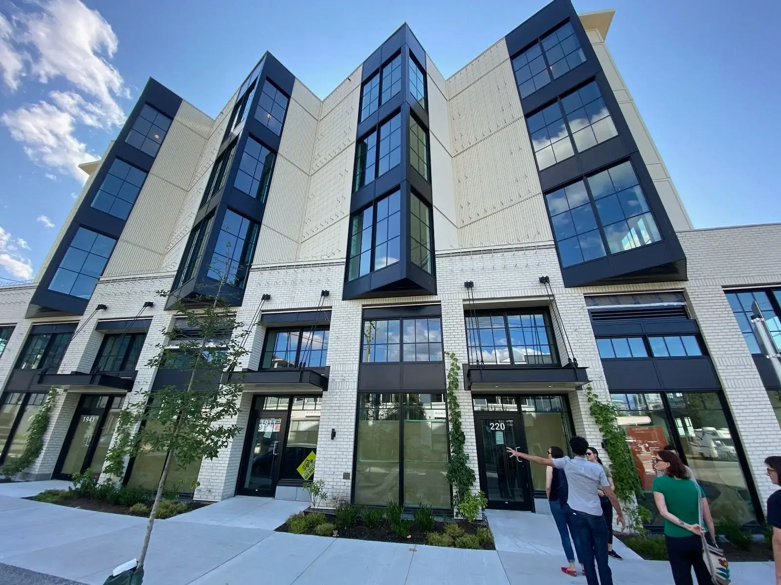 A building is adorned with plants